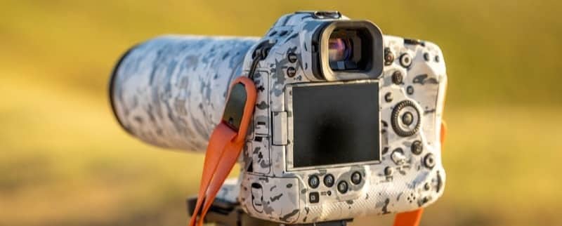 Camera with a unique patterned body and orange strap
